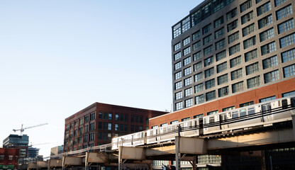 Chicago, Illinois, USA, February 19, 2023: A landscape view of the light rail passing through the...