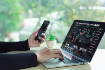 Businesswoman holding tablet and showing hologram graph and stock market statistics earn profit. business planning and strategy, forex trading analysis. Stock market, growth finance