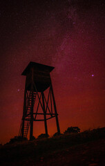 Hunting house in a red galaxy full of stars