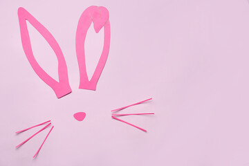 Paper bunny on pink background