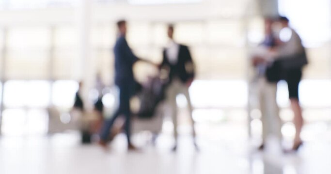Blurred background with copyspace of business people in office for a conference, meeting or work seminar together. Defocused view of professionals, employees or entrepreneurs at a workshop
