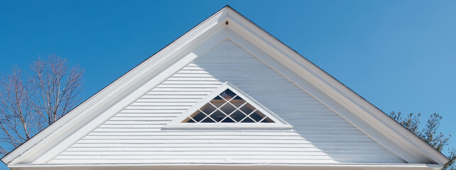 Church roof with triangular window