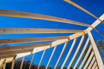 During construction new beam stick home wooden roof framework from trusses was constructed in order to support roof