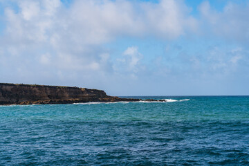 Views while hiking in Montana de Oro State Park. Some of those views are the rocky coastline, bluffs, birds, like seagulls and cormorants, breaking waves, pacific ocean, large trees, rolling hills