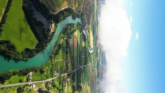 Idyllic landscape of Pinders Pond by Clutha river, New Zealand, aerial vertical view