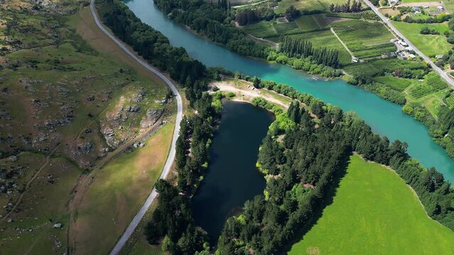 Scenic Pinders Pond Freedom Camping by Clutha river, New Zealand, aerial view