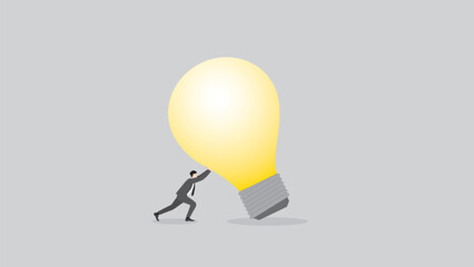 Business idea, creativity, innovation, creation, inspiration, imagination, and thinking concept. A businessman pushes the big light bulb. the business solution, problem-solving from work problem.