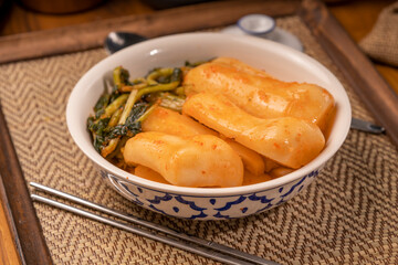 Bachelor kimchi or Radish kimchi  with Ponytail radish Korean traditional fermented vegetable a side dish at meals.