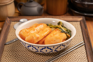 Bachelor kimchi or Radish kimchi  with Ponytail radish Korean traditional fermented vegetable a side dish at meals.