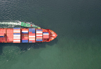 Fototapeta premium high angle view of the shipping system transport containers by cargo ships, international transport, export-import business, logistics
