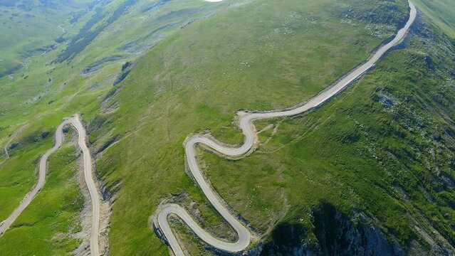 Aerial drone footage of a Romanian mountain road &ndash; Transalpina. It is a 148 km national road located in the Southern Carpathians of Romania and is one of the highest roads of the Carpathian Mountains.