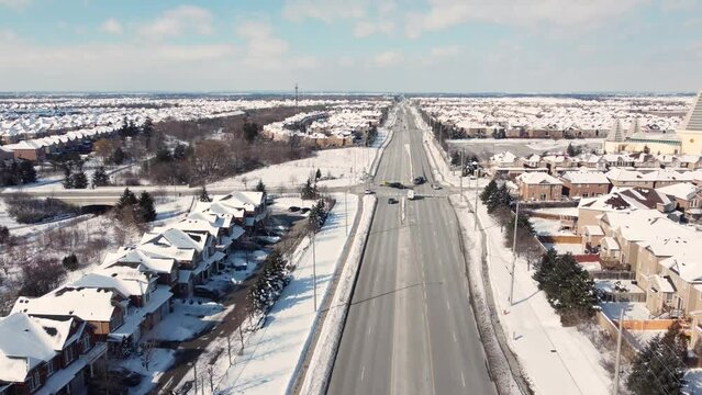 Aerial Flying Over Brampton Residential Urban Townscape Towards Car Crash Accident Scene At Crossroad. Dolly Forward 