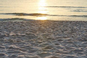 beach sand on coastline on blur sky background