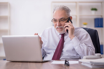 Old male employee and too much work in the office
