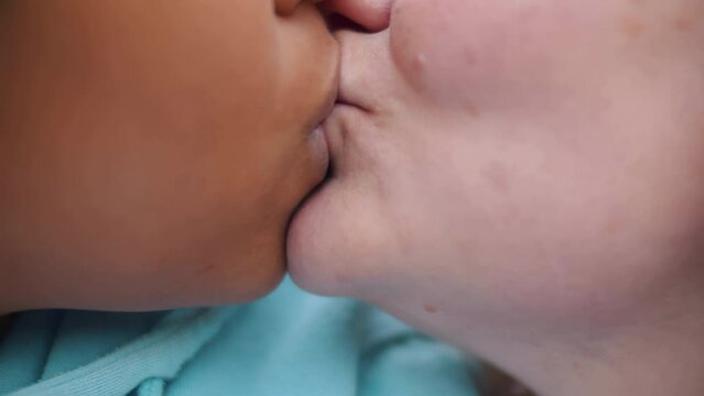 Diverse gay lesbian kiss close-up. Realtime