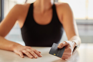 Hands, credit card and payment at gym for fitness membership or exercise subscription. Fintech,...
