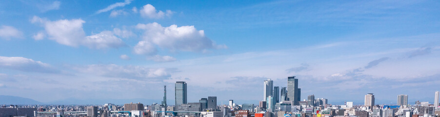 Fototapeta na wymiar blue sky panorama Helicopter shot city