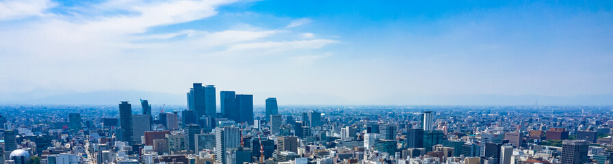 Fototapeta na wymiar Helicopter shot city blue sky panorama