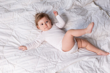 adorable baby in white shirt and diaper on blanket, card, banner, space for text