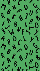 template with the image of keyboard symbols. set of letters. Surface template. green background. Vertical image.