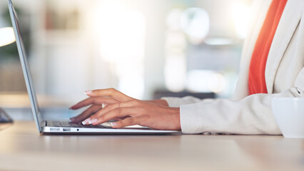 Professional paralegal or attorney typing legal advice and drafting digital business emails to clients with an online software app. Female lawyer writing a report on a laptop at a corporate law firm