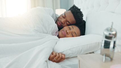 Comfort couple, sleeping in bedroom and morning cuddle for rest, relax and rest break at home....