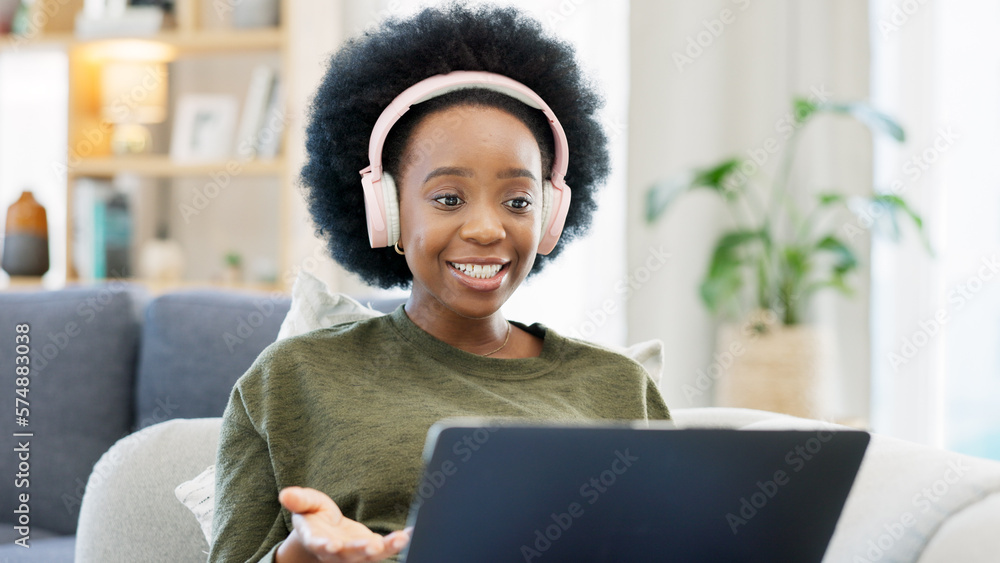 Canvas Prints African woman using laptop and headphones while waving hello during a video call with friends. Student talking to her teacher and learning new language online during online course or private lesson