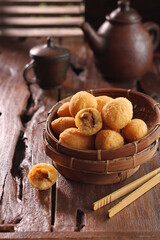 Comro is a typical Sundanese fritters. Comro is made from grated cassava which is shaped round or oval and filled with oncom chili sauce and chili and then fried. 