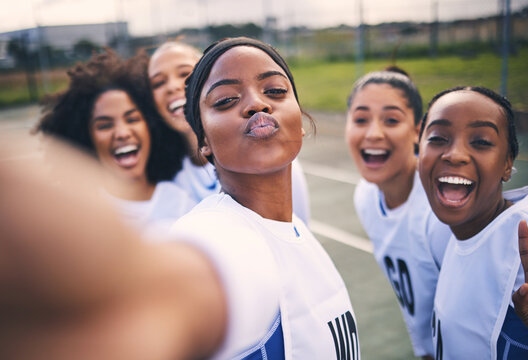 Netball, happy selfie and portrait of girl students on a outdoor sports court for game or workout. Exercise, kiss face and athlete group together for sport, student wellness and teamwork for training
