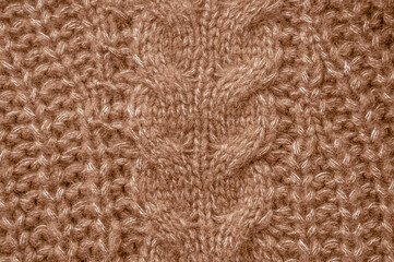 Organic knitting material with macro woven threads.