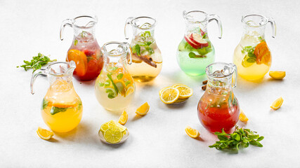 Assorted variety of fresh lemonades in glass jars
