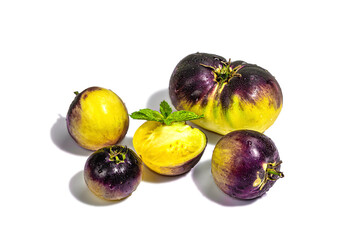 Yellow-violet Tomatoes variety Primary colors isolated on white background