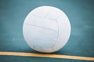 Netball on the floor on a sport court for a game, training or exercise outdoor on a field. Sports,...