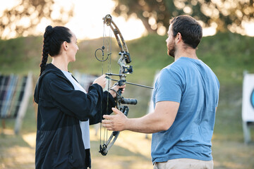 Target, training and archery woman with an instructor on field for hobby, aim and control. Arrow,...