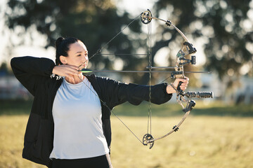 Happy person, bow or arrows aim in sports field, shooting range or gaming nature in hunting, hobby or exercise. Archery, woman or athlete smile with weapon in target training, competition or practice - Powered by Adobe