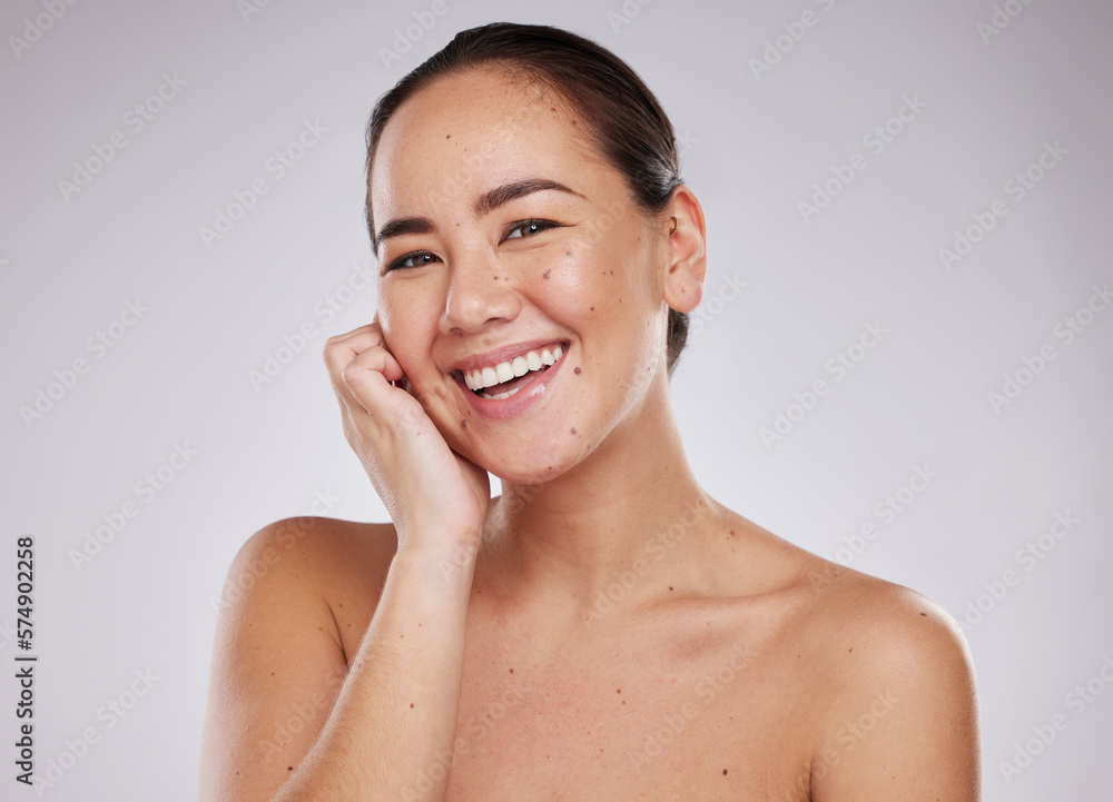 Sticker Asian woman, beauty and face portrait with smile in studio for skincare, dermatology and cosmetics. Happy aesthetic model person with makeup, mole and facial self care for wellness on grey background