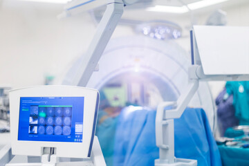 Intraoperative computer tomography machine inside modern operating room for advanced spine...