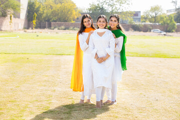 Indian Independence day or Republic day concept. Three happy young beautiful woman wearing...