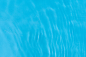Fototapeta na wymiar Vibration on blue water under sunlight. Top view, flat lay