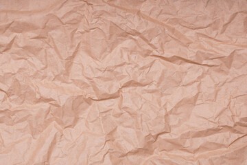 Obraz premium crumpled creased brown paper background texture