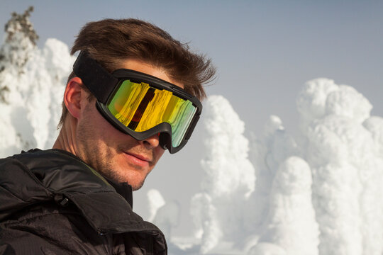 Snowshoer wearing goggles on Big White Mountain, British Columbia, Canada