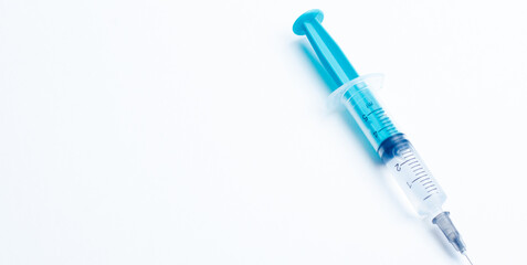 Fototapeta premium Disposable plastic syringe prepared for injection and vaccination in the hospital. The concept of medicine and health