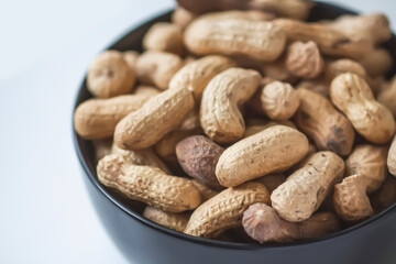 Unpeeled nuts close up. Peanuts.