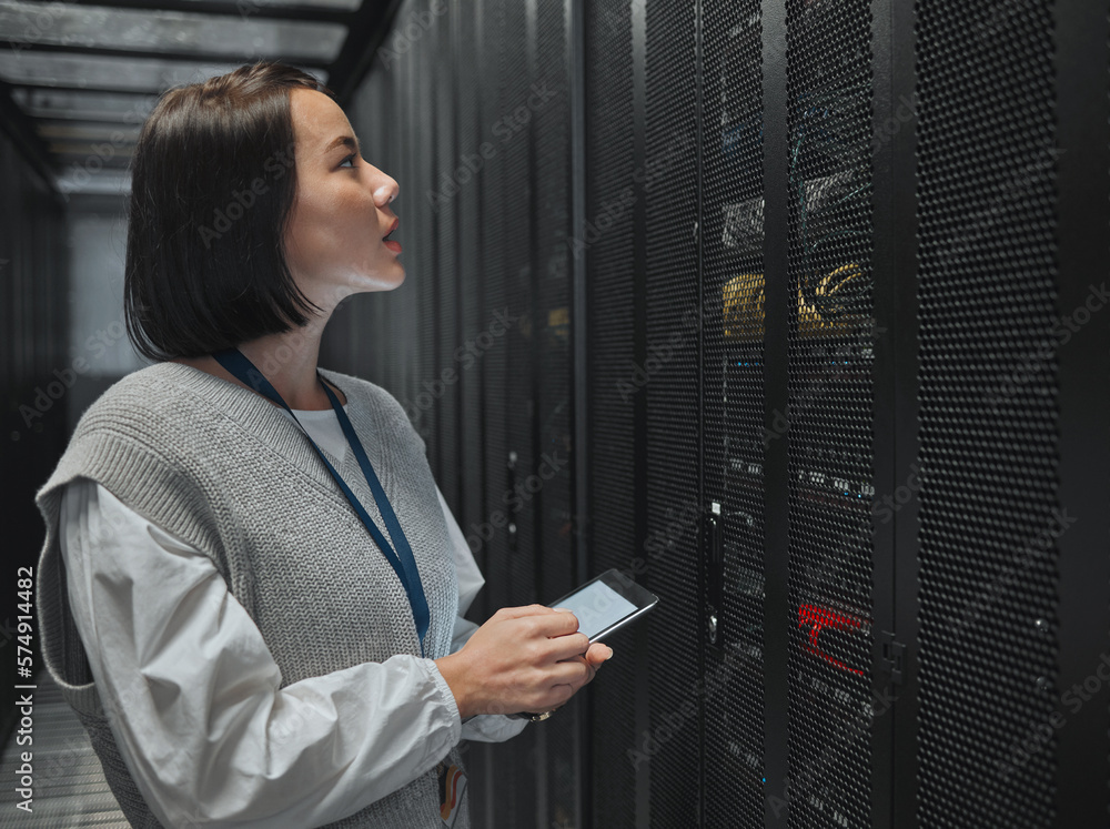 Fototapete Tablet, server room and big data with a programmer asian woman at work on a computer mainframe. Software, database and information technology with a female coder working alone on a cyber network