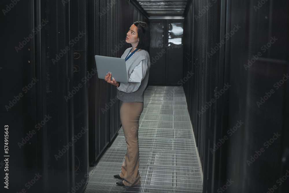 Poster woman with laptop, server room and information technology, technician and datacenter with software u