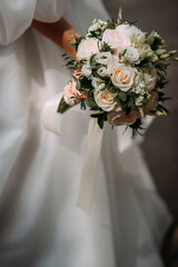 Close-up of the wedding bouquet in the hands of the bride 4443.