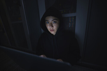 Laptop, hacker and server with portrait of woman for coding, software and cyber security....