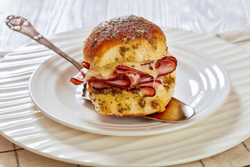 Hawaiian Ham and Swiss Slider on white plate