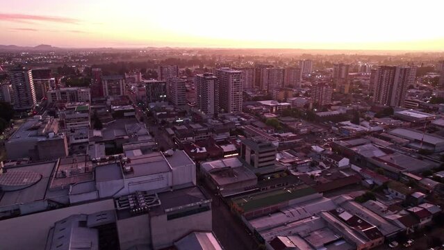 Sunset Over Picturesque City Skyline Of Temuco In Araucania Region, Chile. wide aerial