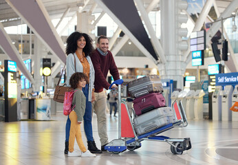 Travel, airport and happy family with suitcase trolley for holiday, vacation or immigration journey. Luggage of black woman or diversity parents with child or kid walking in lobby excited for flight - obrazy, fototapety, plakaty